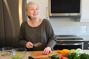 Oma Gerhild cutting veggies