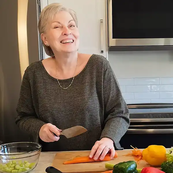 Oma Gerhild chopping veggies